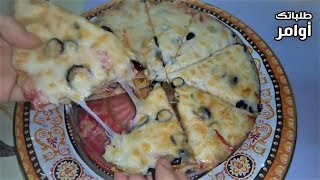البيتزا التي خطفت قلوب الملايين مثل المطاعم عجينة هشة وجبنة مطاطية نتيجة رائعة