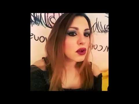 Hot girl with heavy makeup smoking makeup artist