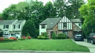 DRIVING BY HOUSING RESIDENTIAL IN MANHASSET, NEW YORK, (SPRING 2020) 4K/60