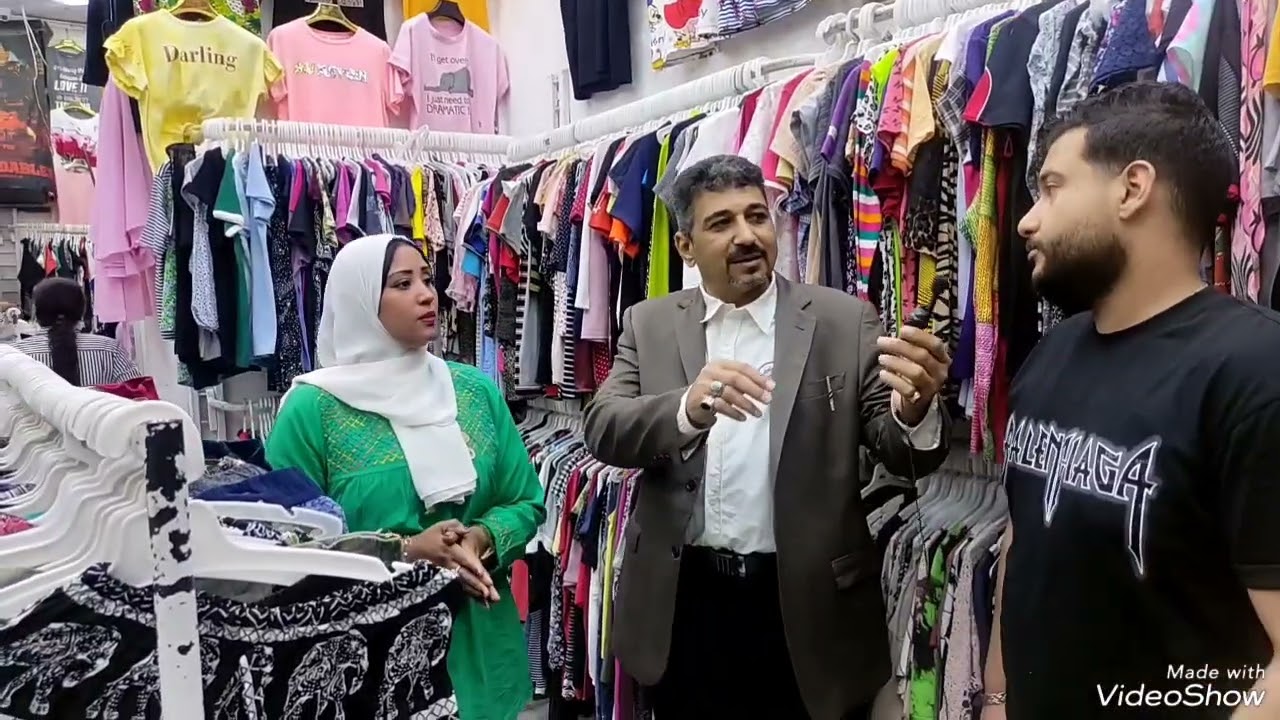 من داخل وكاله البلح محل ملابس الحاج حسن عبد الشافي واولاده مع المذيعة أمينة أمين