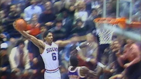 Dr. J famous "Rock the Baby" Cradle Dunk against t...