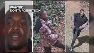 Man accused of shooting at officers while being served a warrant