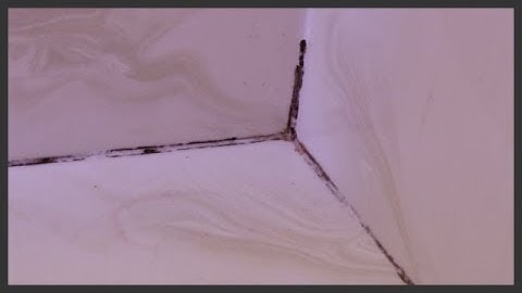 Remove & replace moldy shower caulk