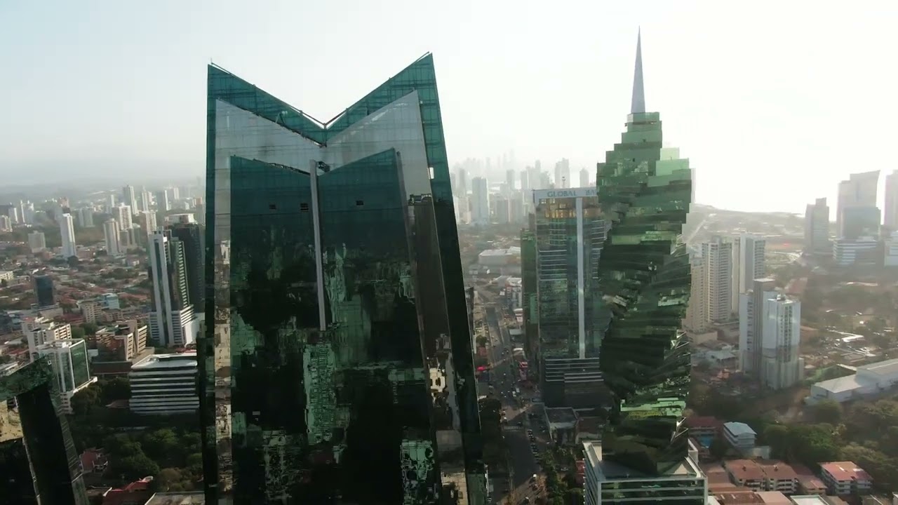 Two modern buildings with a glass facade | Free video footage in 4K