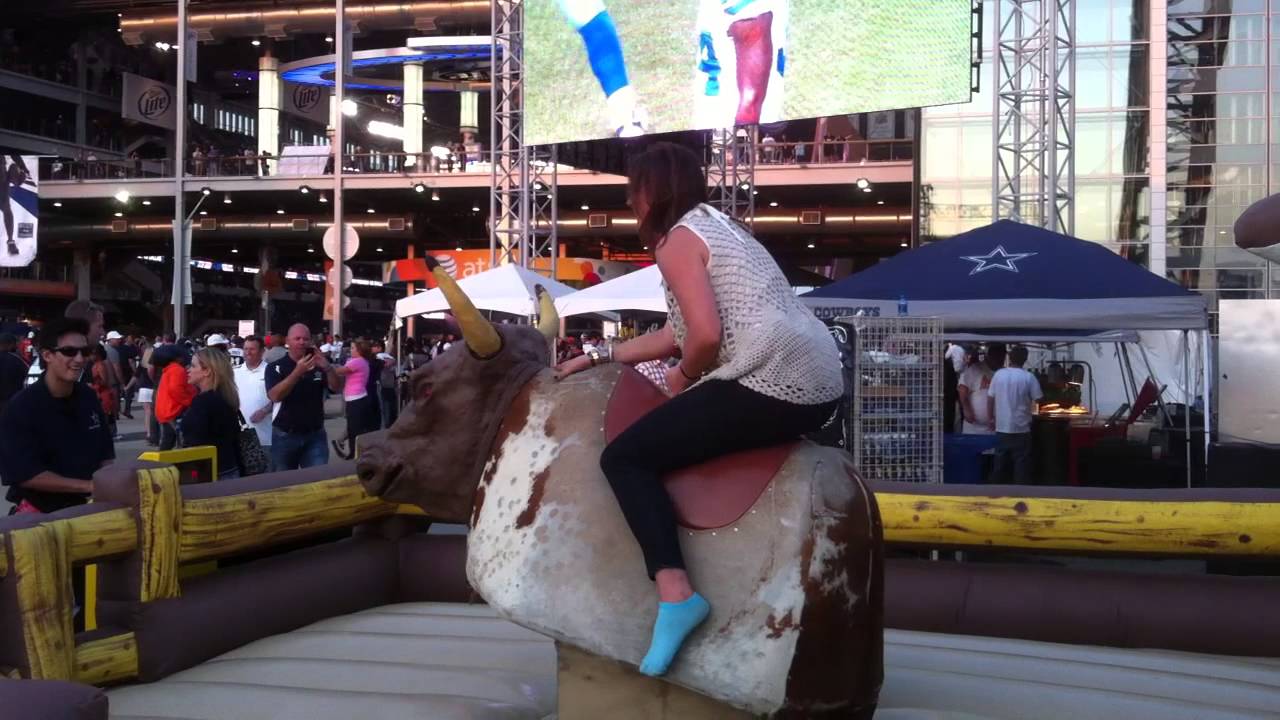 mechanical bull riding at cowboy stadium YouTube