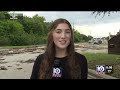 Flooding along Waco Drive tears up road in front of apartment complex