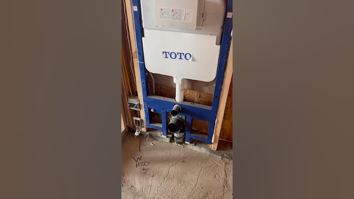 Wall mount toto toilet.#plumbing #construction #shorts #viral #milwaukeetools #homerepair #diy