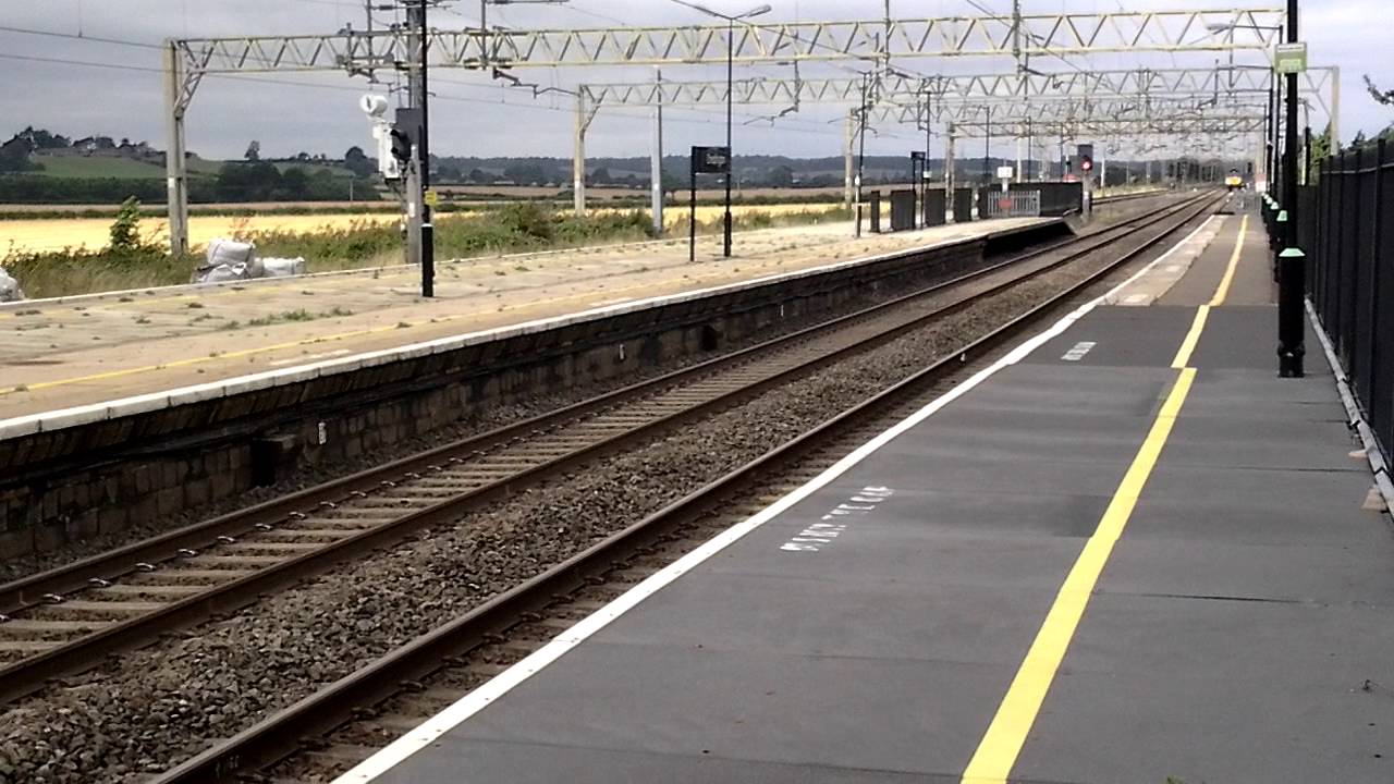 DRS Class 66 66434 Passes Cheddington On The Tesco Train Bound For
