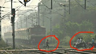 People Risking Life In Front Of High Speed Train: 22121 LTT -Lucknow AC Sf Express People Risking Life In Front Of High Speed Train: 22121 LTT -Lucknow AC Sf Express