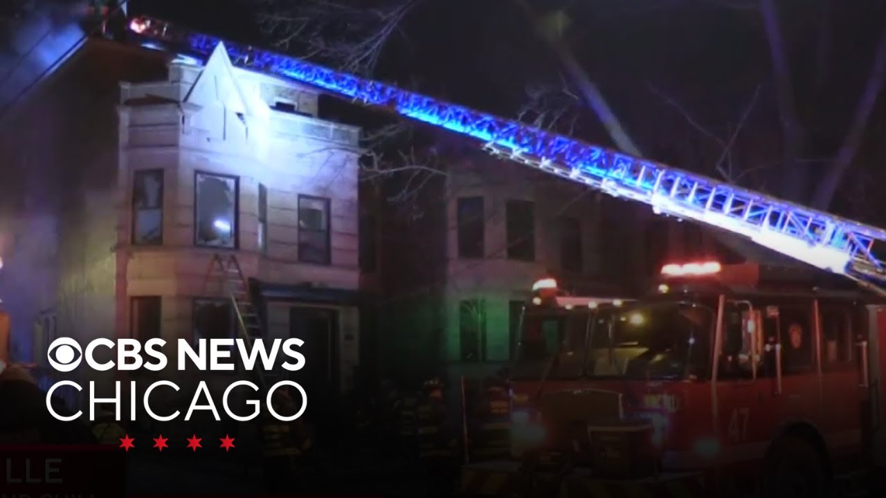 Firefighters battle house fire in Andersonville - YouTube