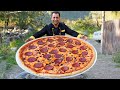 Amazing Giant pizza recipe | Homemade spicy pizza recipe | Wilderness Cooking Pizzas by Tavakkul