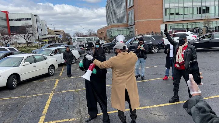 Pastor Alvin Jackson Sr. praying at Detroit Receiving Hospital - Honk for HOPE