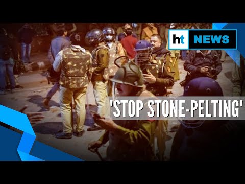 Jamia crackdown: Video shows Delhi police urging students to stop stone pelting