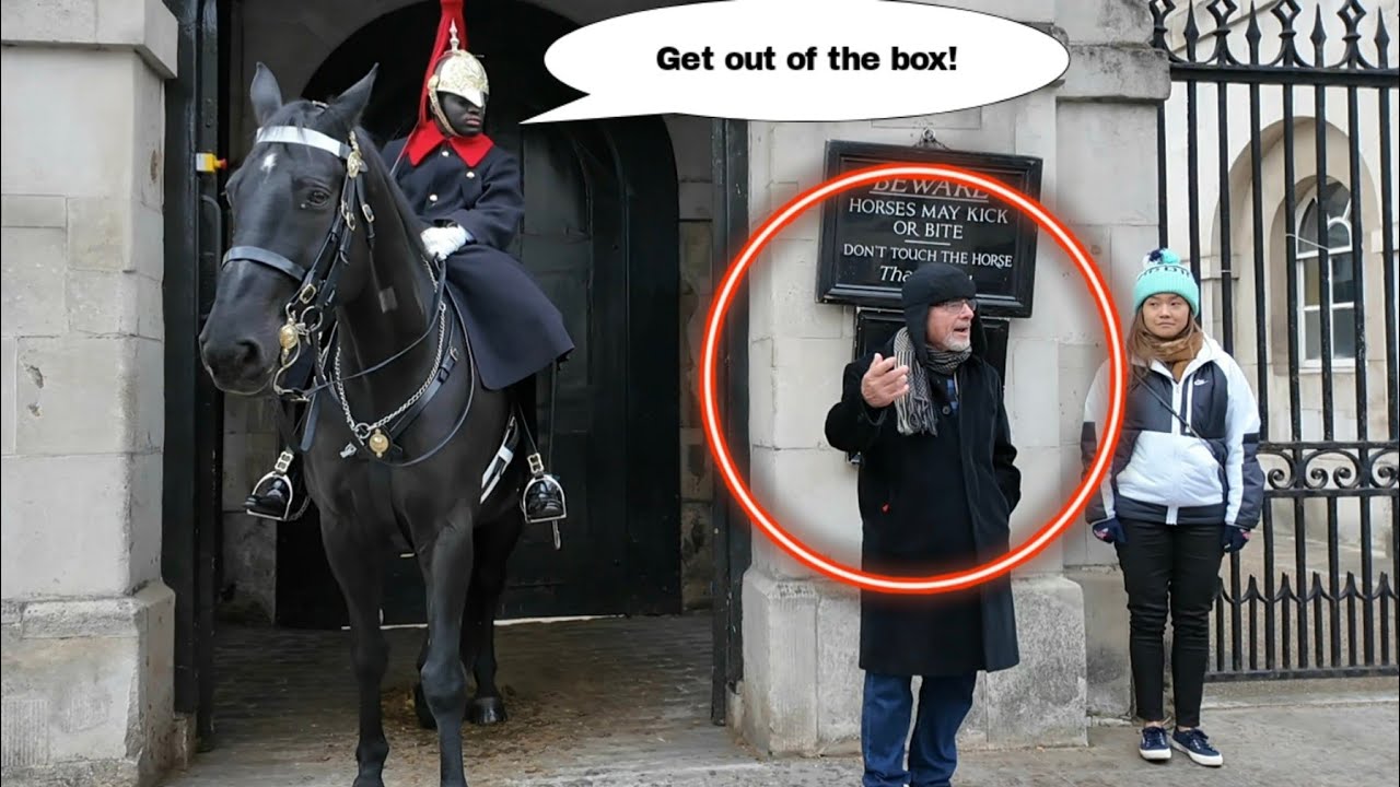 The guard immediately reprimanded the old man when he entered the box!