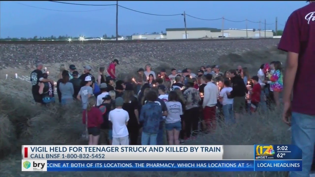 Vigil held for teen struck and killed by train - YouTube