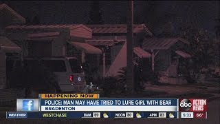Man offers Teddy bear, speaks to girl