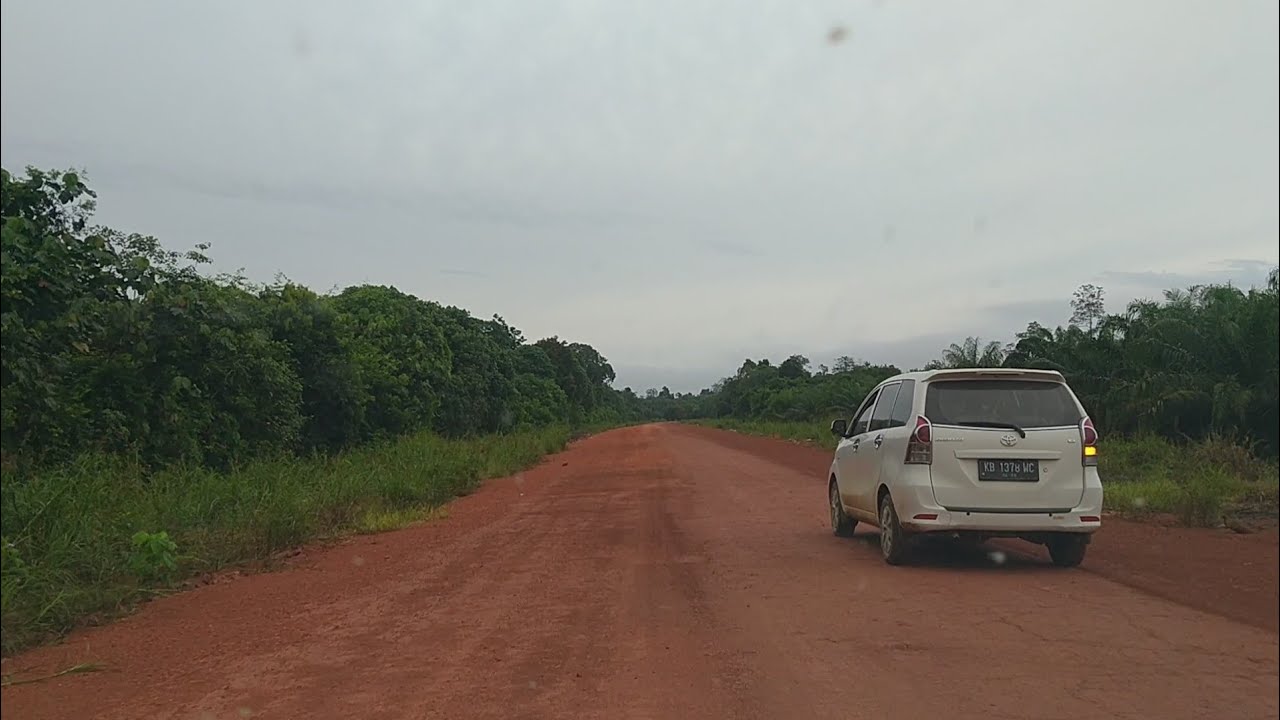 Sukadana menuju Kota Pontianak melewati jalan Perawas Simpang Dua