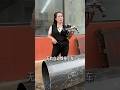 A young woman teaches you step-by-step how to use an automatic welding carriage: