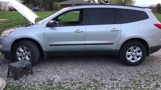 How to replace the driver side headlight bulb on a 2011 Chevy Traverse .