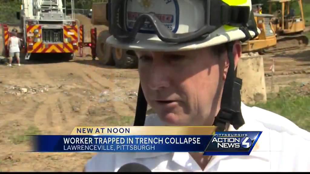Trapped worker rescued from trench in Lawrenceville - YouTube