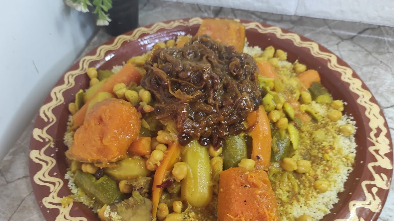 كسكس بالدجاج والتفاية