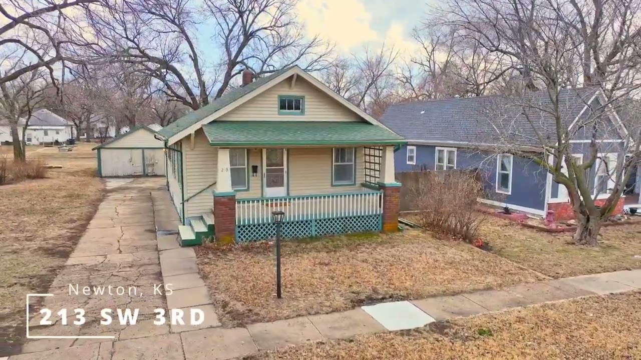 Exterior Teaser | 213 SW 3rd Newton KS | Aimee Monares Real Estate RE/MAX Associates