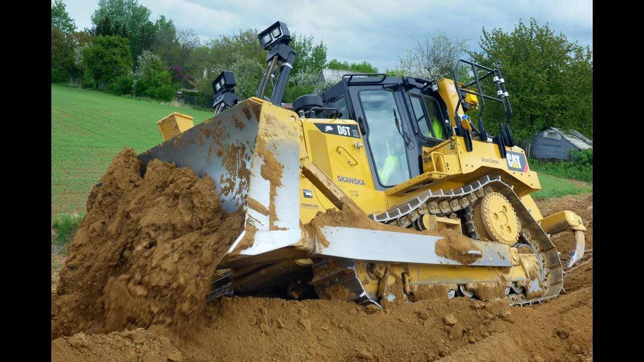 CAT D6T pushing side slope - YouTube
