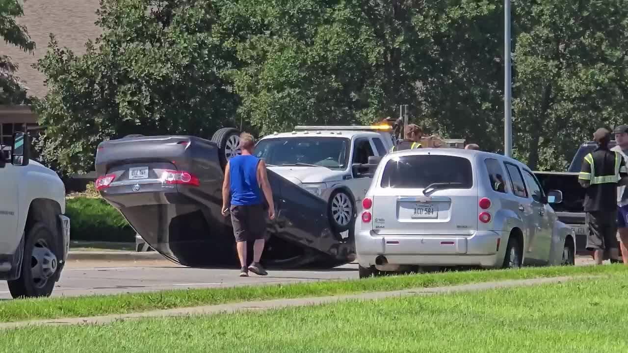 Car flips onto its roof after crash in east Lincoln - YouTube