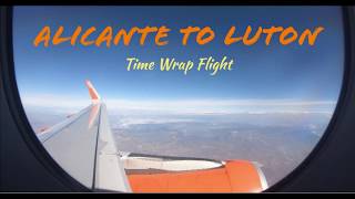 Alicante to Luton Airport flight side view - HD time lapse. Resimi