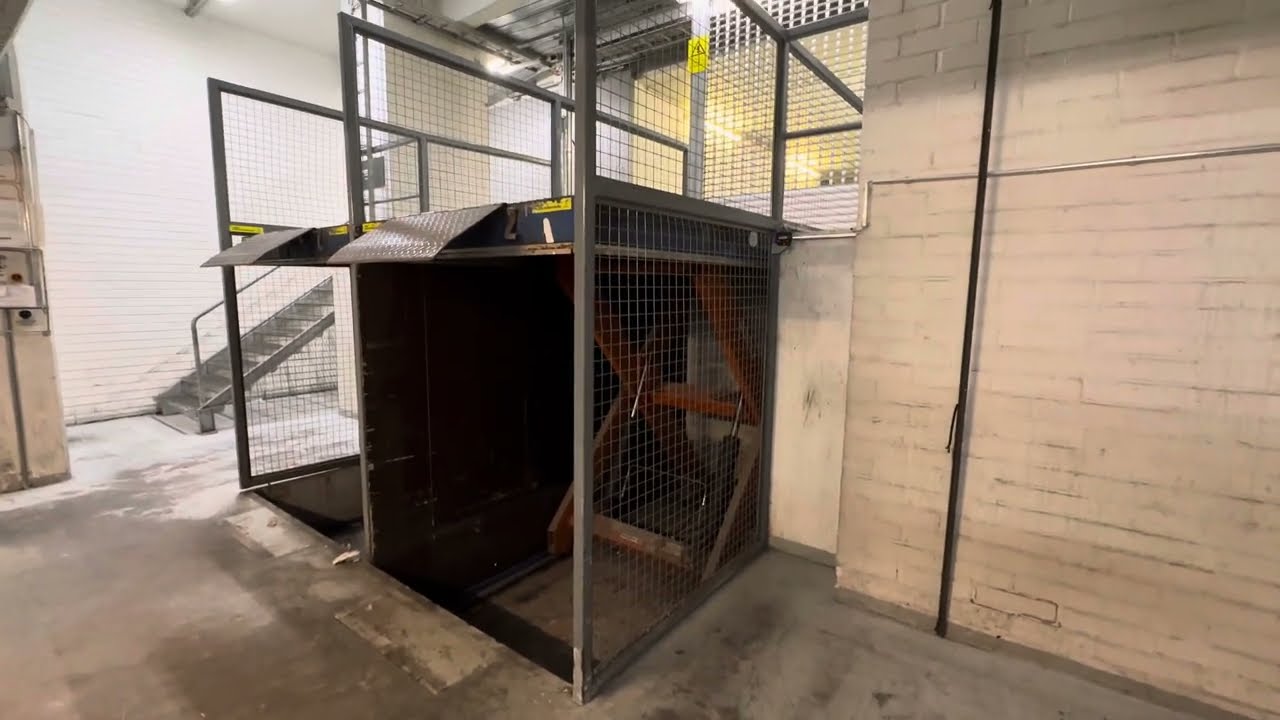 2004 Roltex SL46 cherry picker hydr. fr. platform elev. (west) @ Kamppi Helsinki shopping center, FI