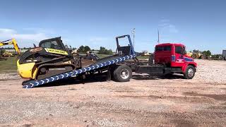 Loading A Skidsteer On A Rollback Wrecker Tow Truck