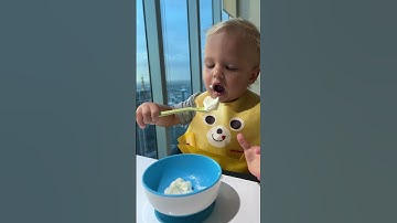 So yummy yogurt! Baby David eating yogurt by himself