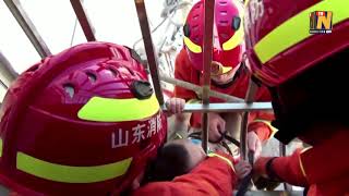 Firefighters rescue boy stuck in fifth floor window