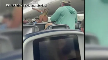 Delta customer shares video of unruly couple in flight