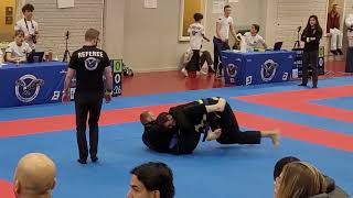 BJJ Blue Belts Match Ends With Bow And Arrow Choke