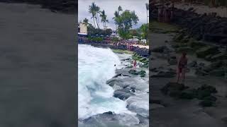 Lady's Attempt to Enter Ocean Meets Waves and Rocks