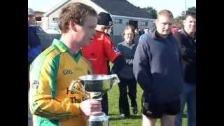 Ougherard Junior C Captain Lawrence o Toole receives the West Board Cup
