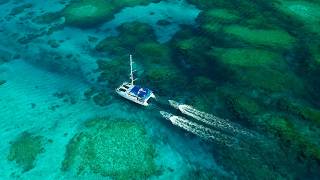 Sailing remote atolls Fishing Diving Exploring