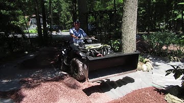 Yamaha Kodiak 700 with Warn ProVantage winch and 54" bucket .