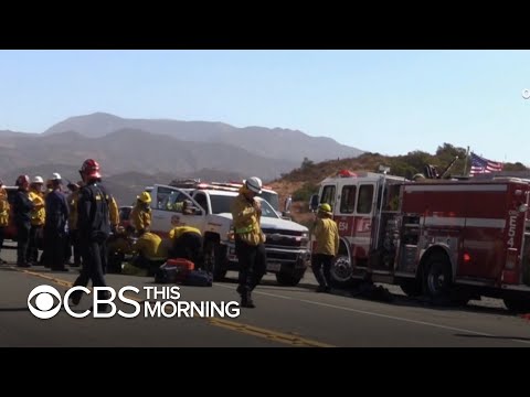2 firefighters critically injured in Southern California fires; thousands forced to evacuate