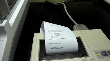 The mini printer connected to ATY224 via our own developed adapter