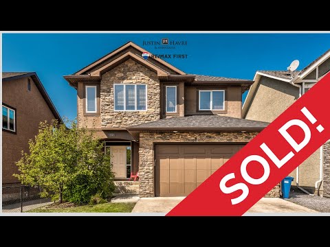 SOLD in Aspen Woods!