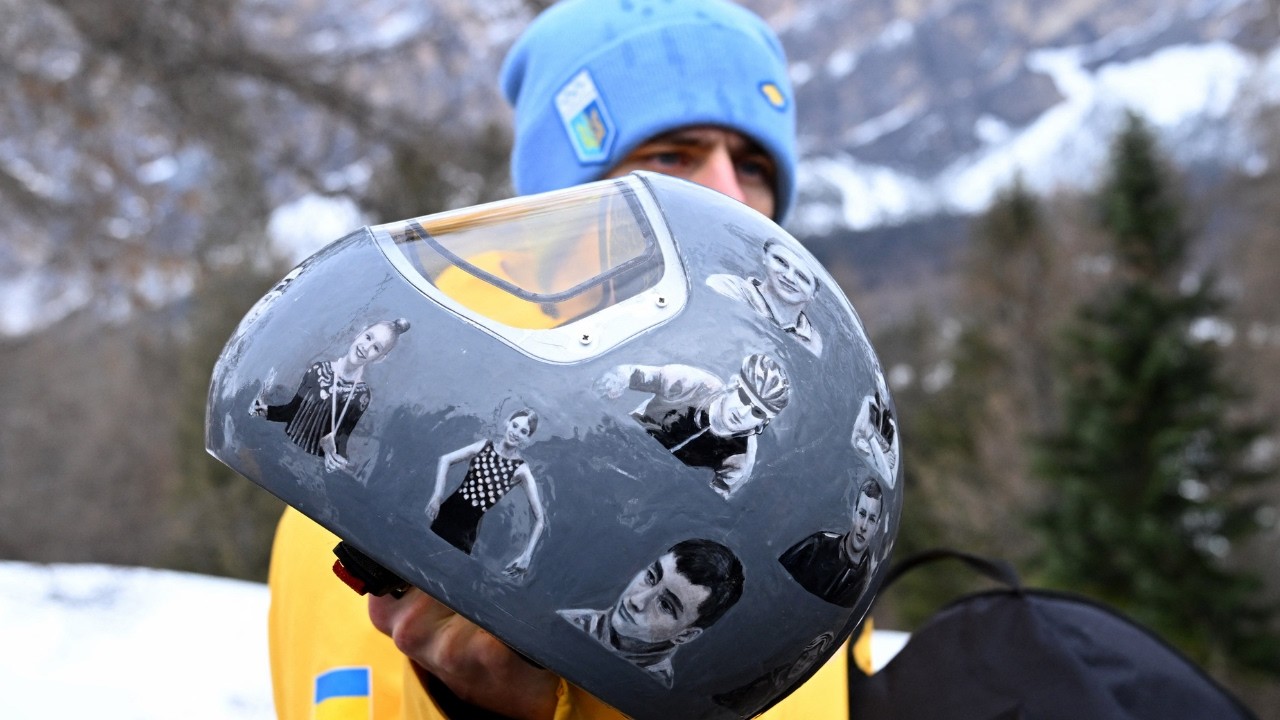 Tearful IOC boss justifies banning Ukrainian athlete for remembrance helmet