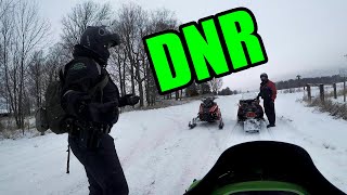 Got pulled over by the DNR on our Snowmobiles!