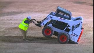 Bobcat Tip Demo.  John Deere skid steer is way more stable