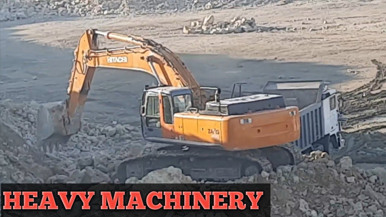Heavy Excavator loading dump truck. Hitachi Zx450lc YouTube