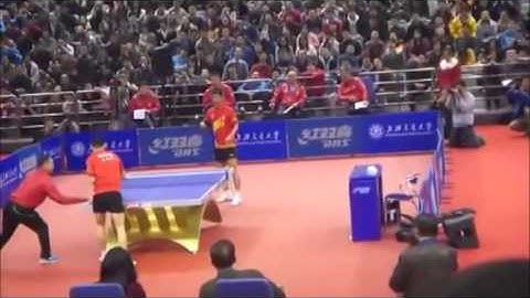 Zhang Jike & Ma Long go around the table. Show TT