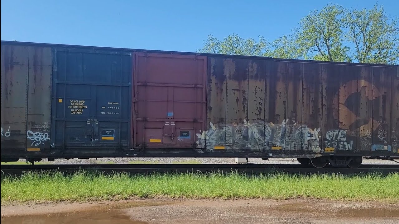 Union Pacific WB Auto rack train (Mostly) with 2 Chessie System Box
