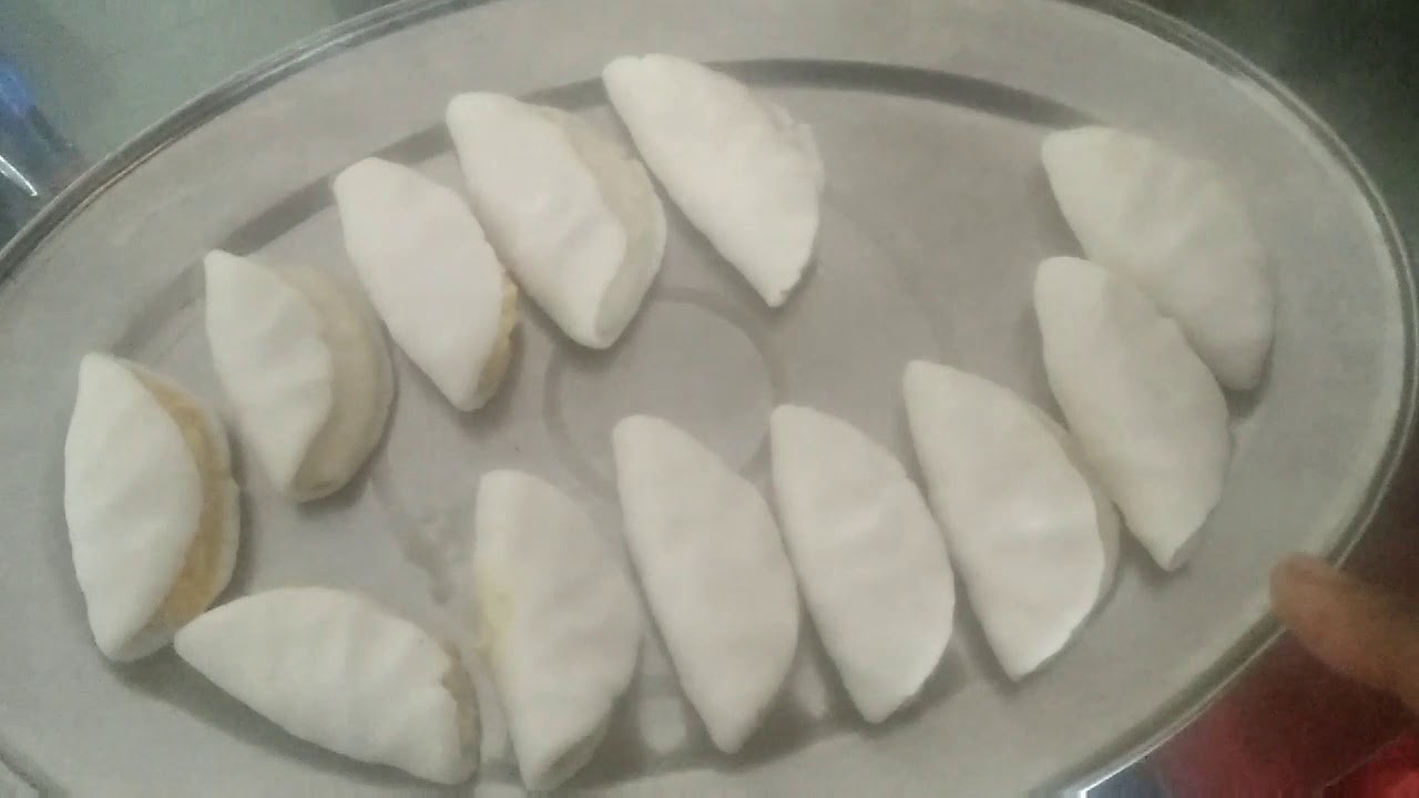 Jharkhand staple food 'pitha' / rice and lentils dumplings - YouTube