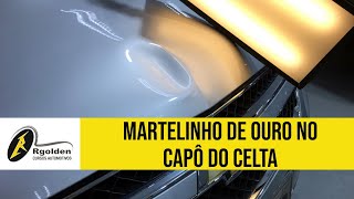 Martelinho de Ouro no Capô do Celta